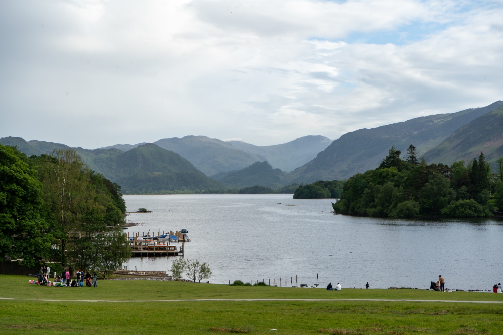Derwentwater from Crow Park, boats at the landing stages and the Jaws of Borrowdale beyond